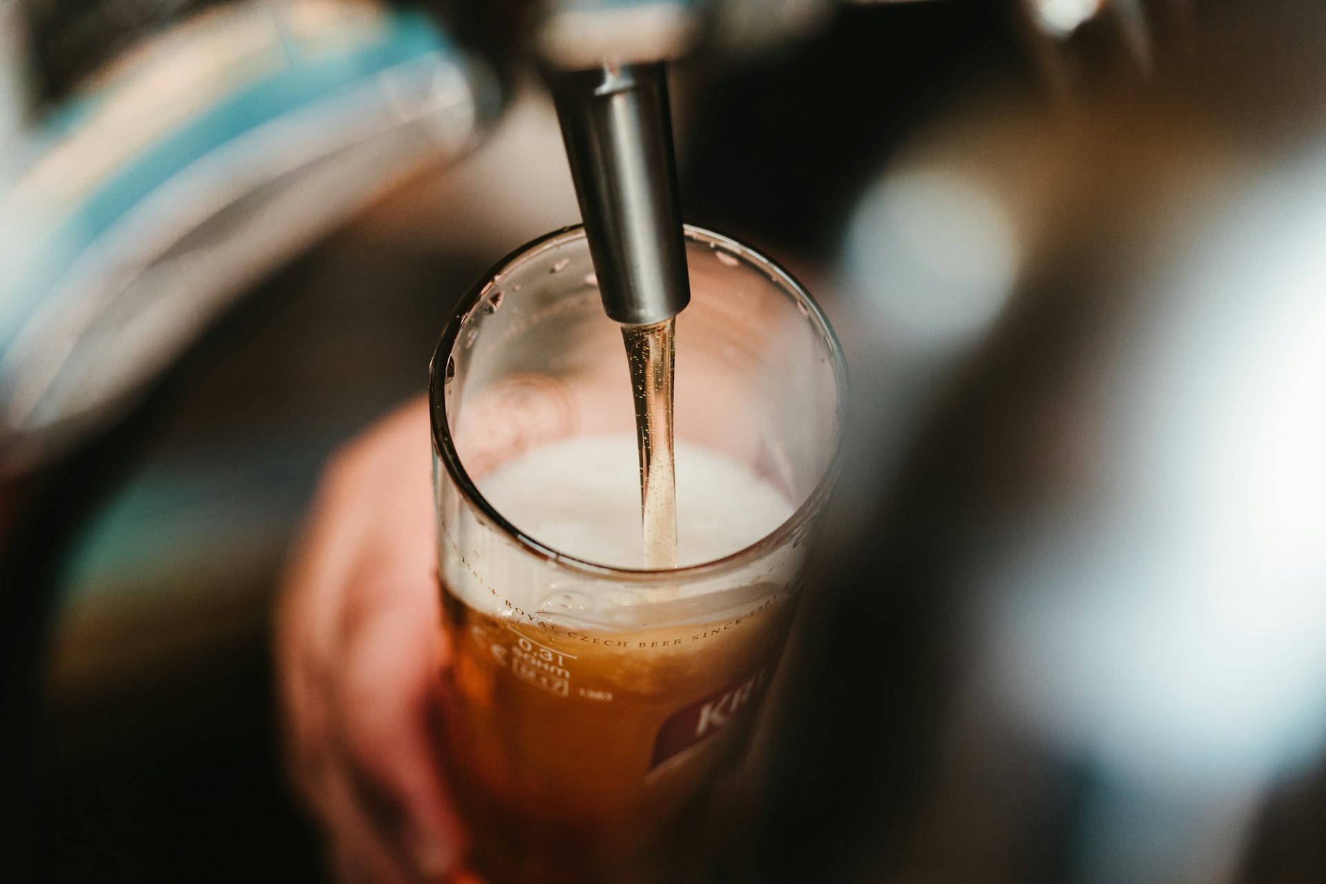 Close-up of the Hops tap handles lined up along the bar